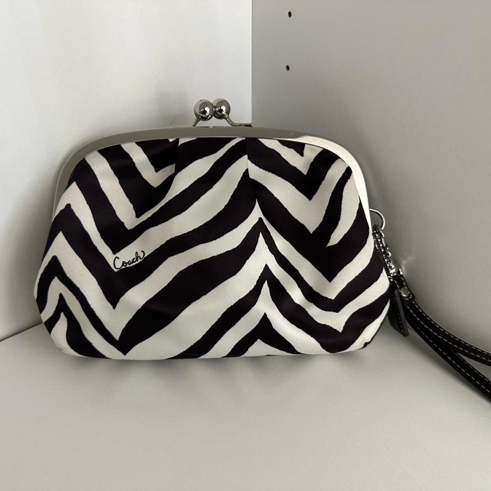 Coach zebra satin wrislet pouch